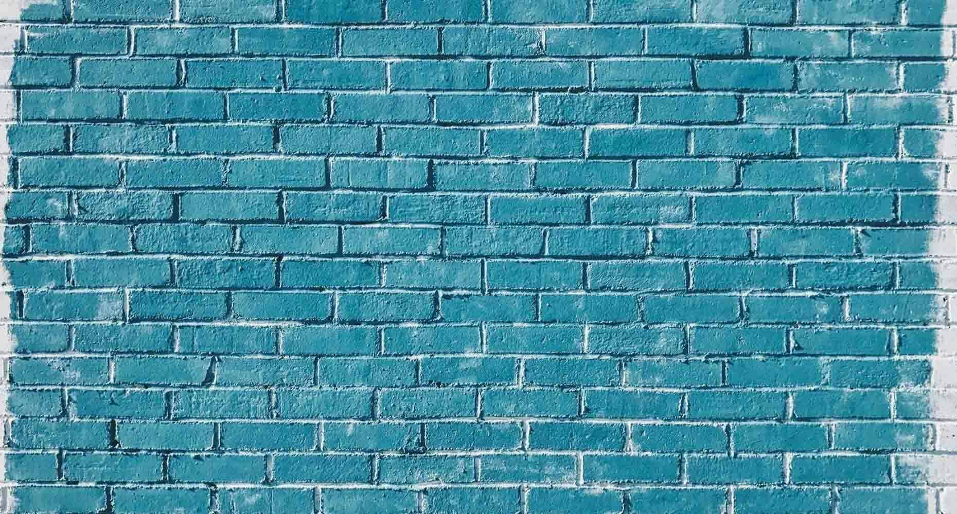Painted brick wall teal