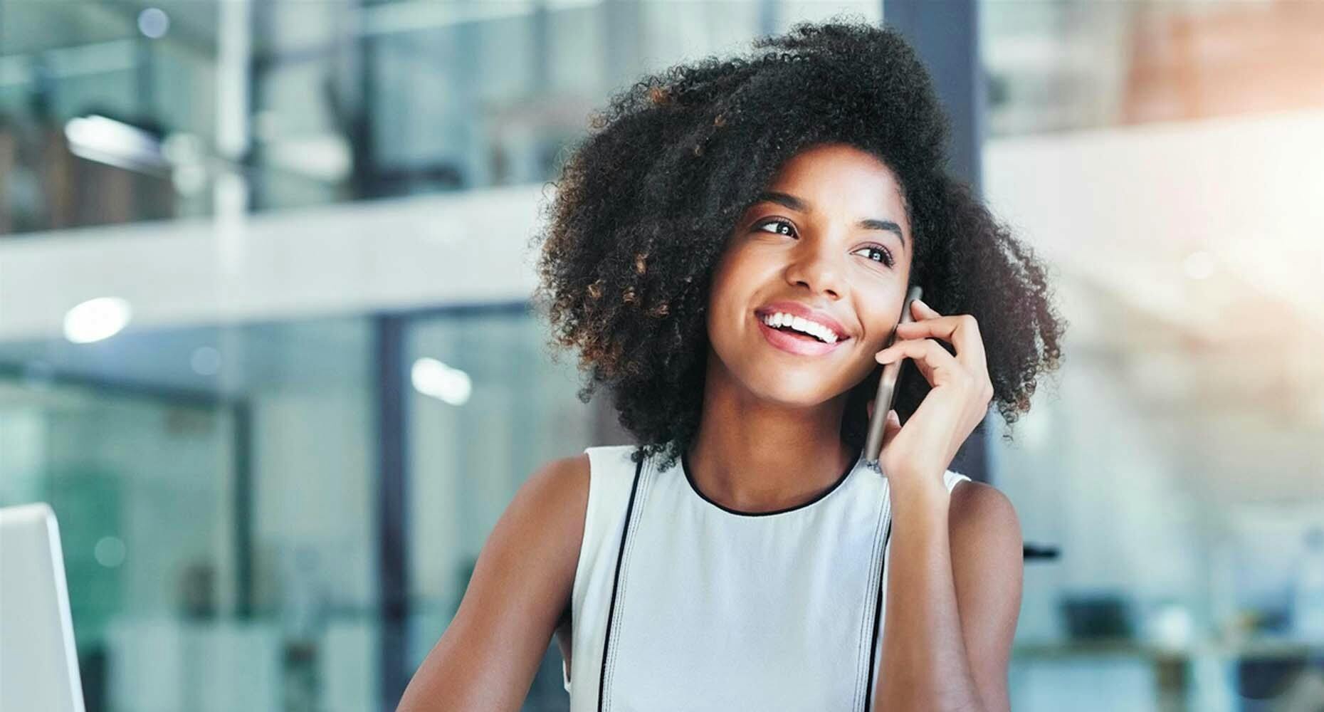 Sales woman smiling on the phone