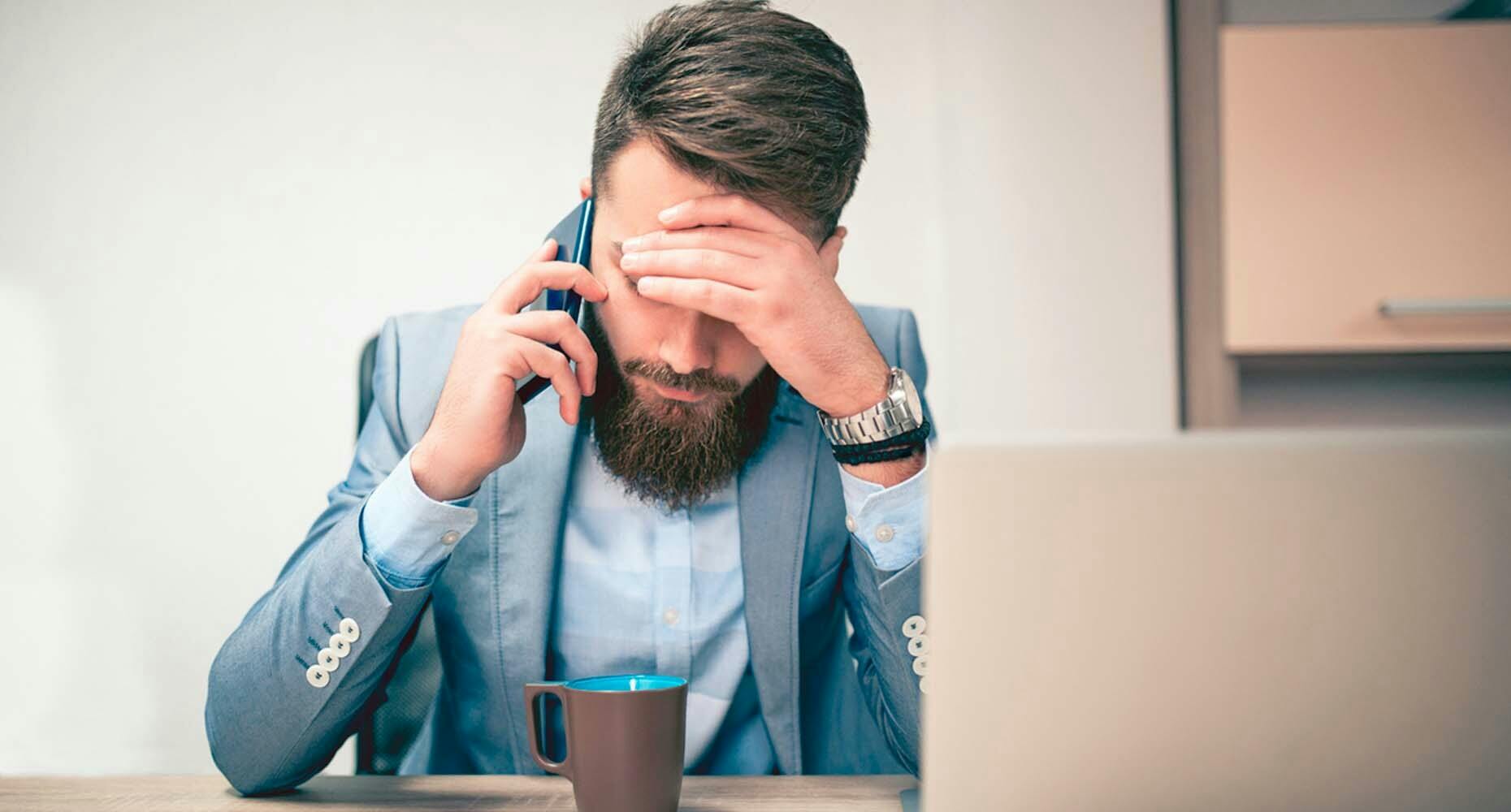 An illustration of a salesperson on the phone, looking shy or hesitant, reflecting the challenges and nuances of communication and negotiation in sales interactions.
